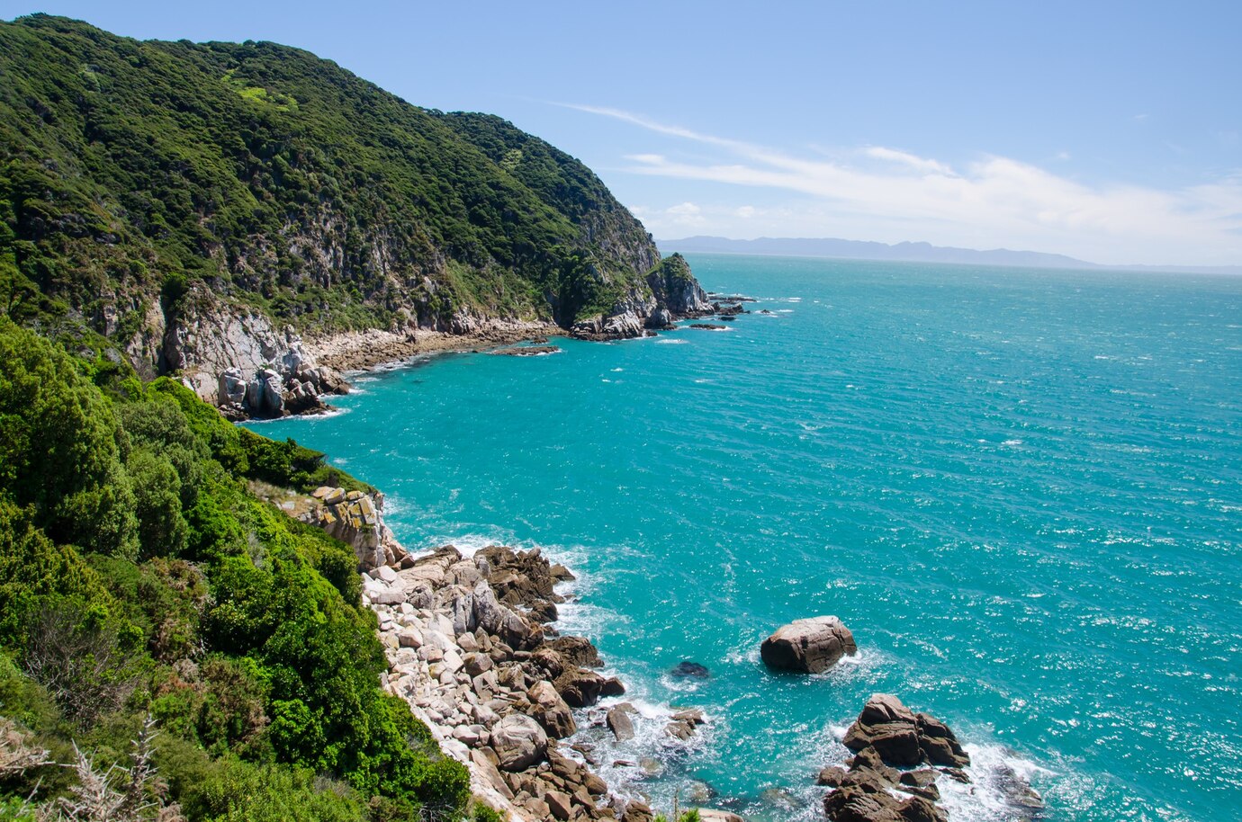 high-angle-shot-blue-sea-from-abel-tasman-track-new-zealand_181624-41958